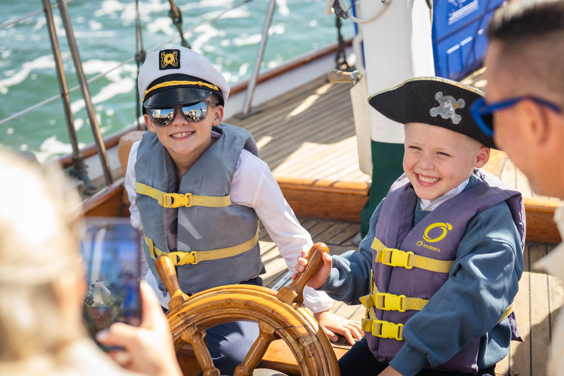 Kids at the Helm aboard JADA