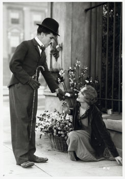 Publicity still from City Lights (1931), Charlie Chaplin — made three years after the sound revolution, demonstrating that the grammar of the silent film was a choice, not a limitation